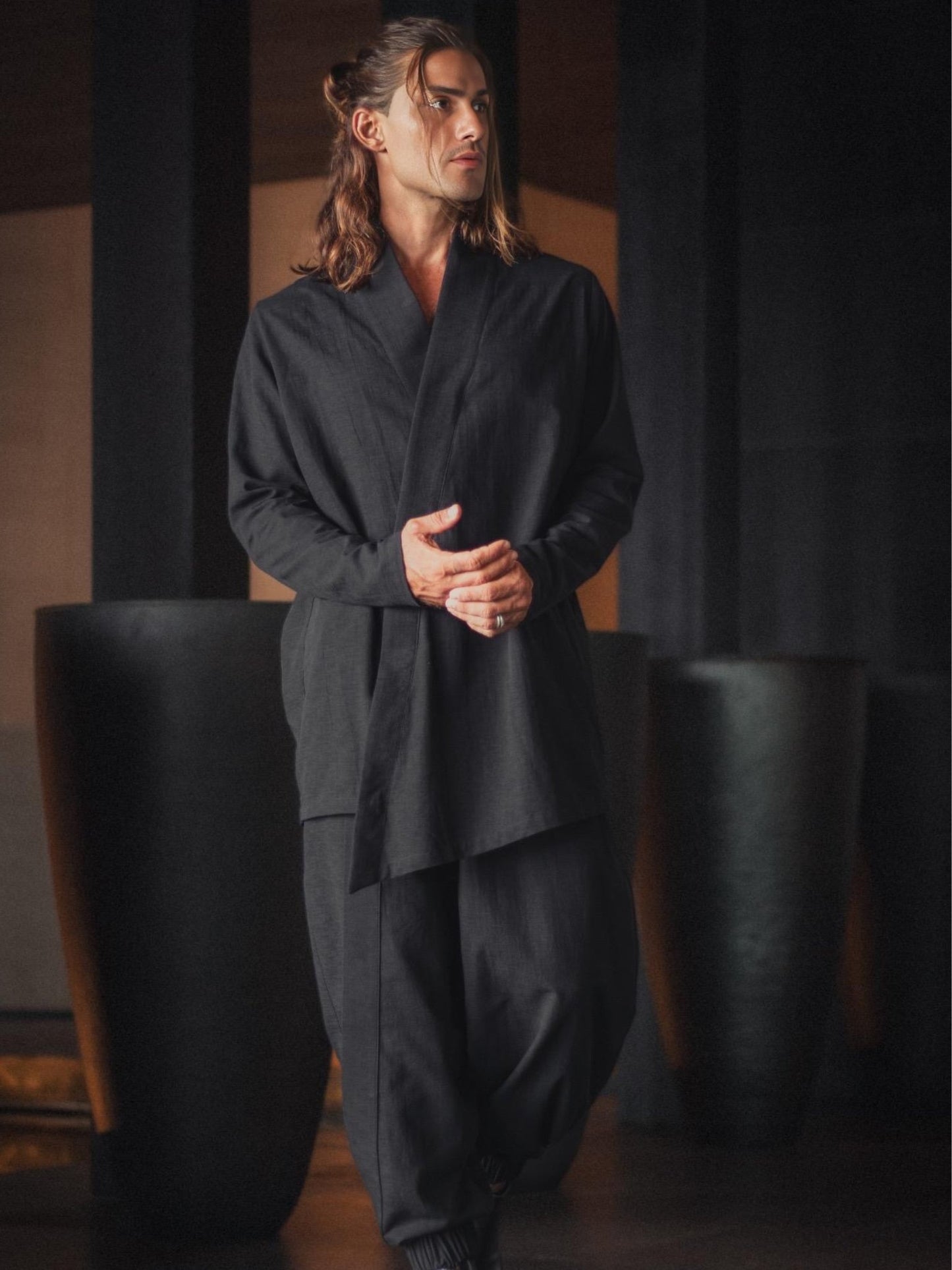 Black zip-up shirt made of 100% cotton. Inspired by Japanese design with clean lines, asymmetry, and comfort. Perfect for daily wear and modern style.