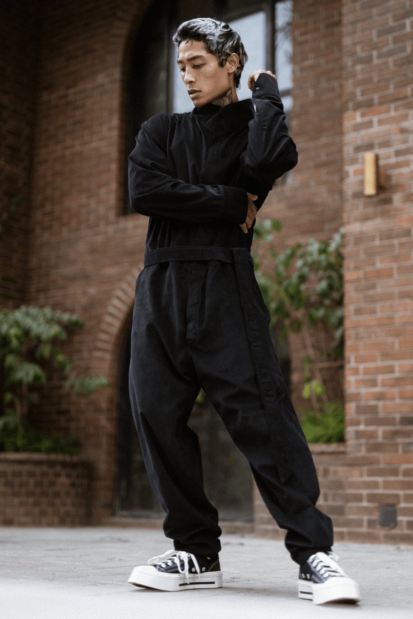 Black jumpsuit with sneakers on sale