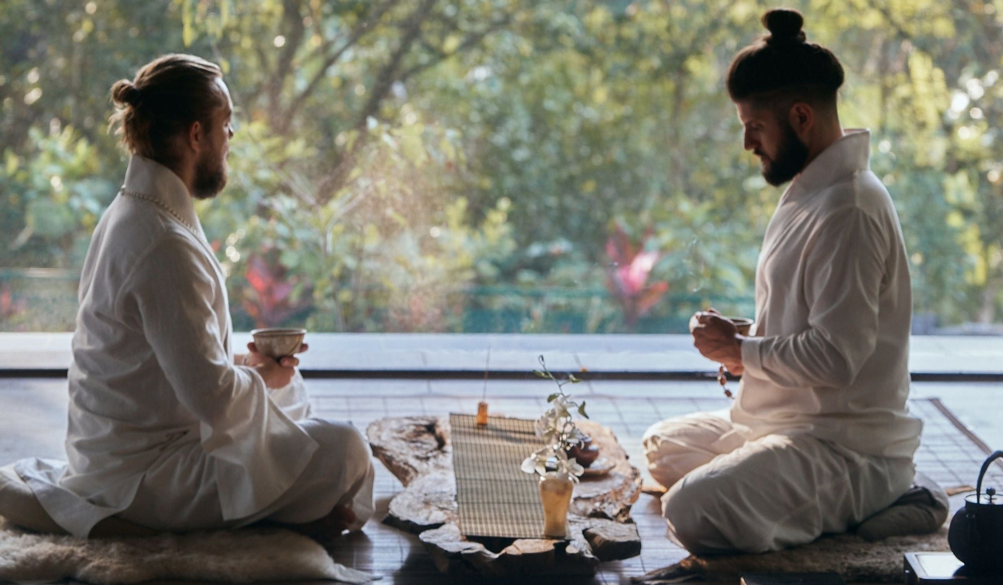 Tea meditation ritual in minimalist OVERZ clothing, focus and presence