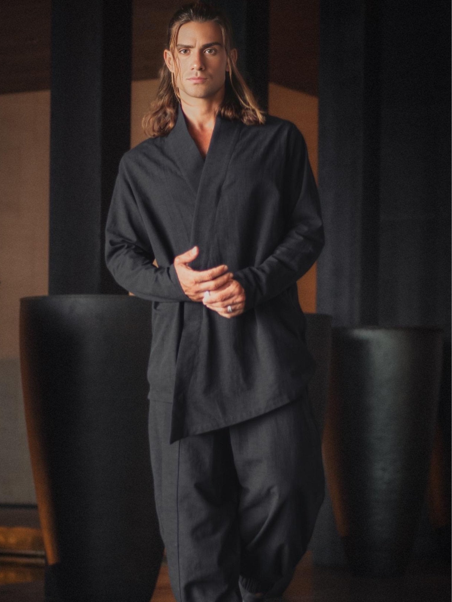 Black zip-up shirt made of 100% cotton. Inspired by Japanese design with clean lines, asymmetry, and comfort. Perfect for daily wear and modern style.