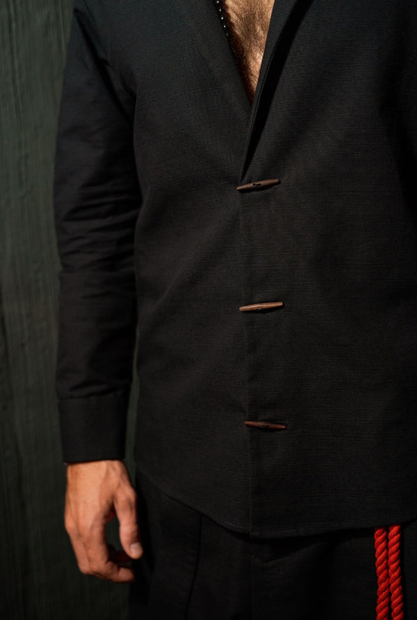 Structured black shirt jacket for men, clean lines and precise cut, modern everyday outer layer, OVERZ Bali.