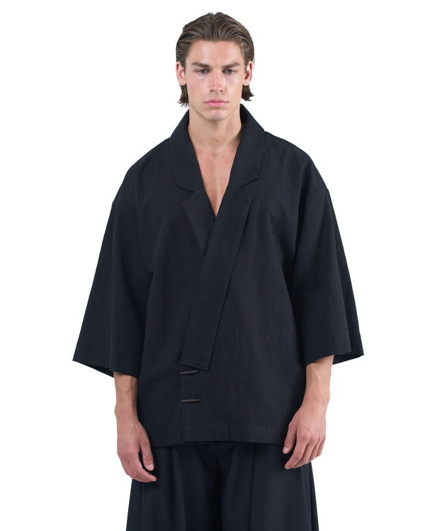 Black kimono-style blazer with accent collar and wooden buttons by OVERZ