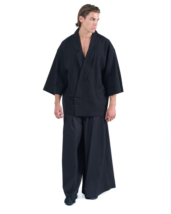 Black kimono-style blazer with accent collar and wooden buttons by OVERZ