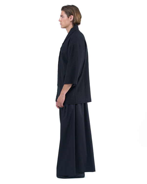 Black kimono-style blazer with accent collar and wooden buttons by OVERZ