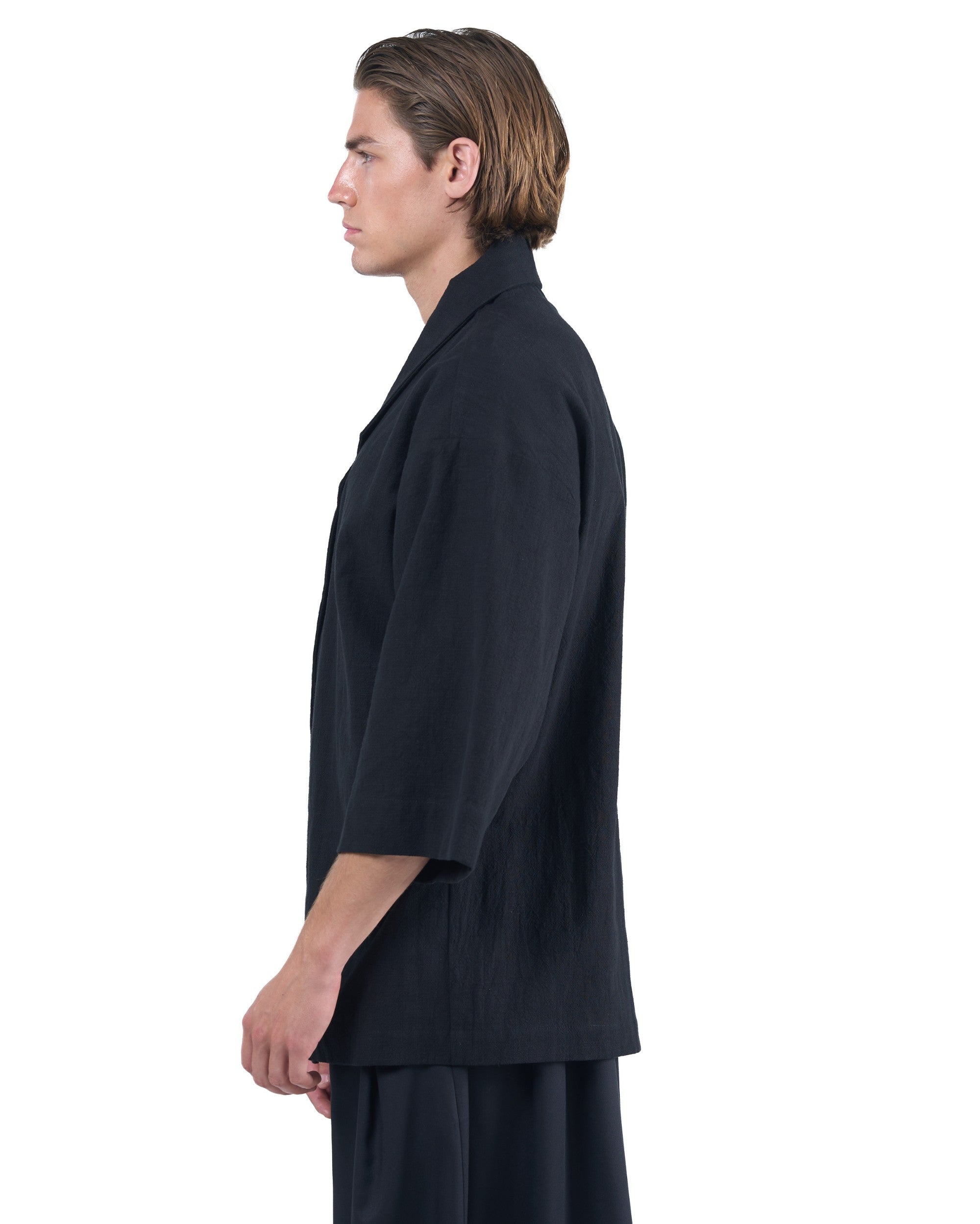 Black kimono-style blazer with accent collar and wooden buttons by OVERZ