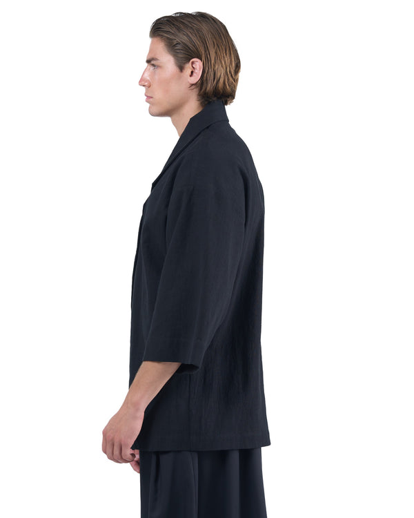 Black kimono-style blazer with accent collar and wooden buttons by OVERZ
