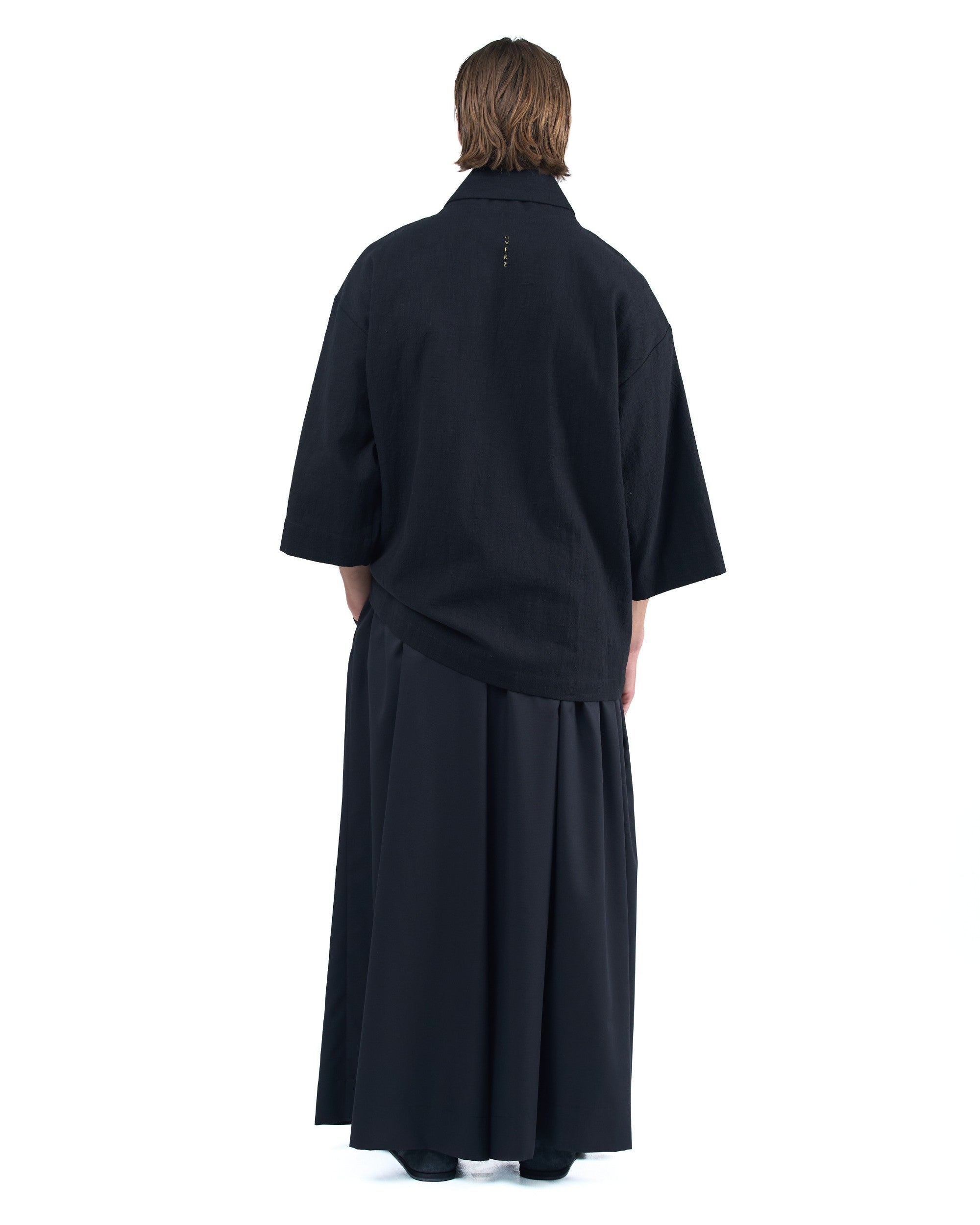 Black kimono-style blazer with accent collar and wooden buttons by OVERZ
