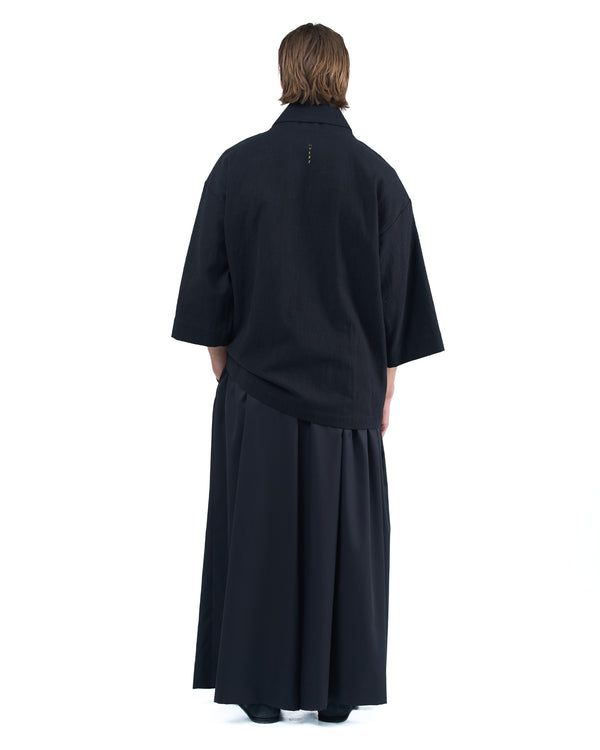 Black kimono-style blazer with accent collar and wooden buttons by OVERZ
