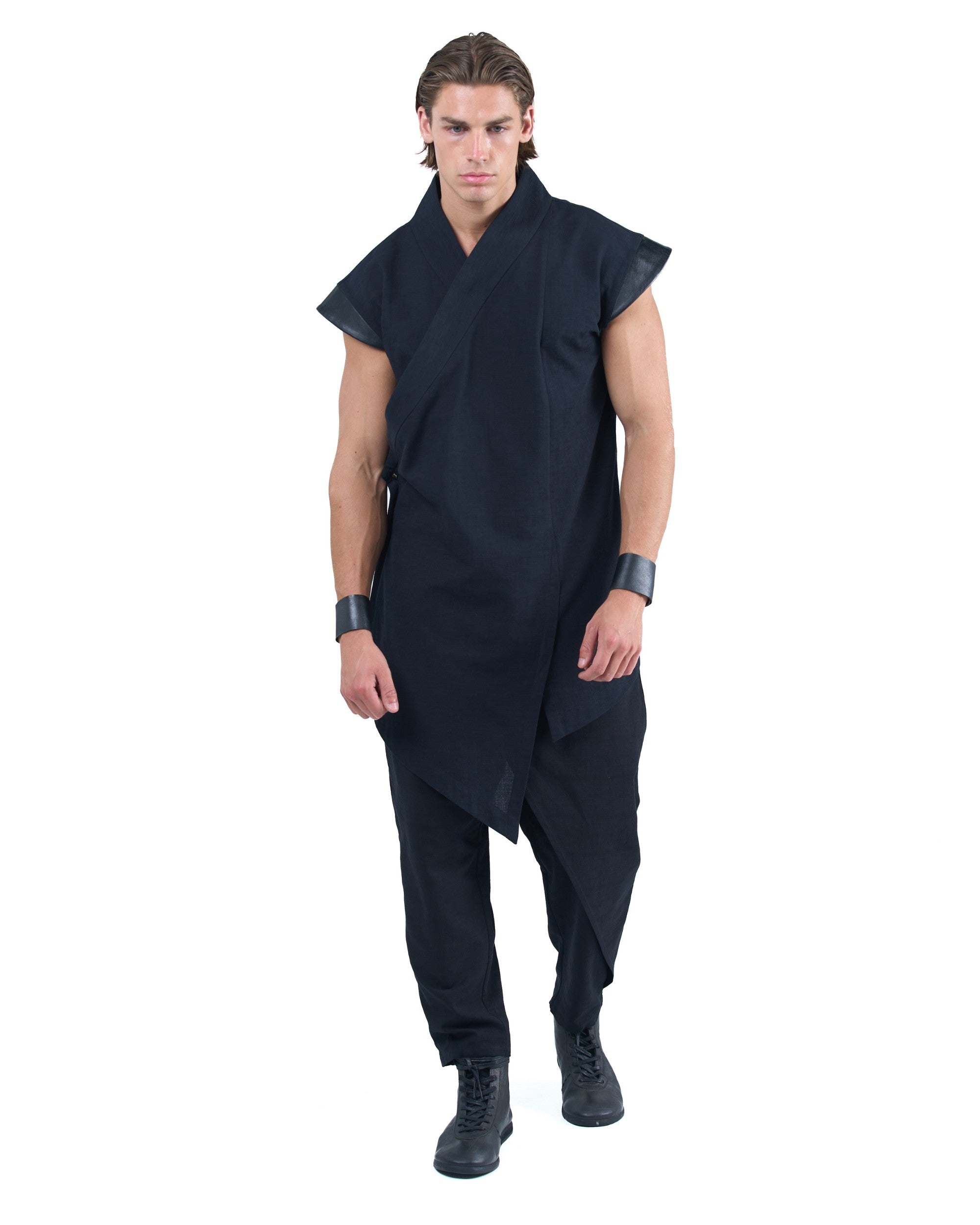 Black asymmetric kimono-style shirt with leather shoulders and wrap front by OVERZ worn by male model