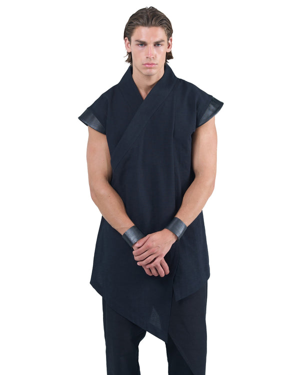 Black asymmetric kimono-style shirt with leather shoulders and wrap front by OVERZ worn by male model