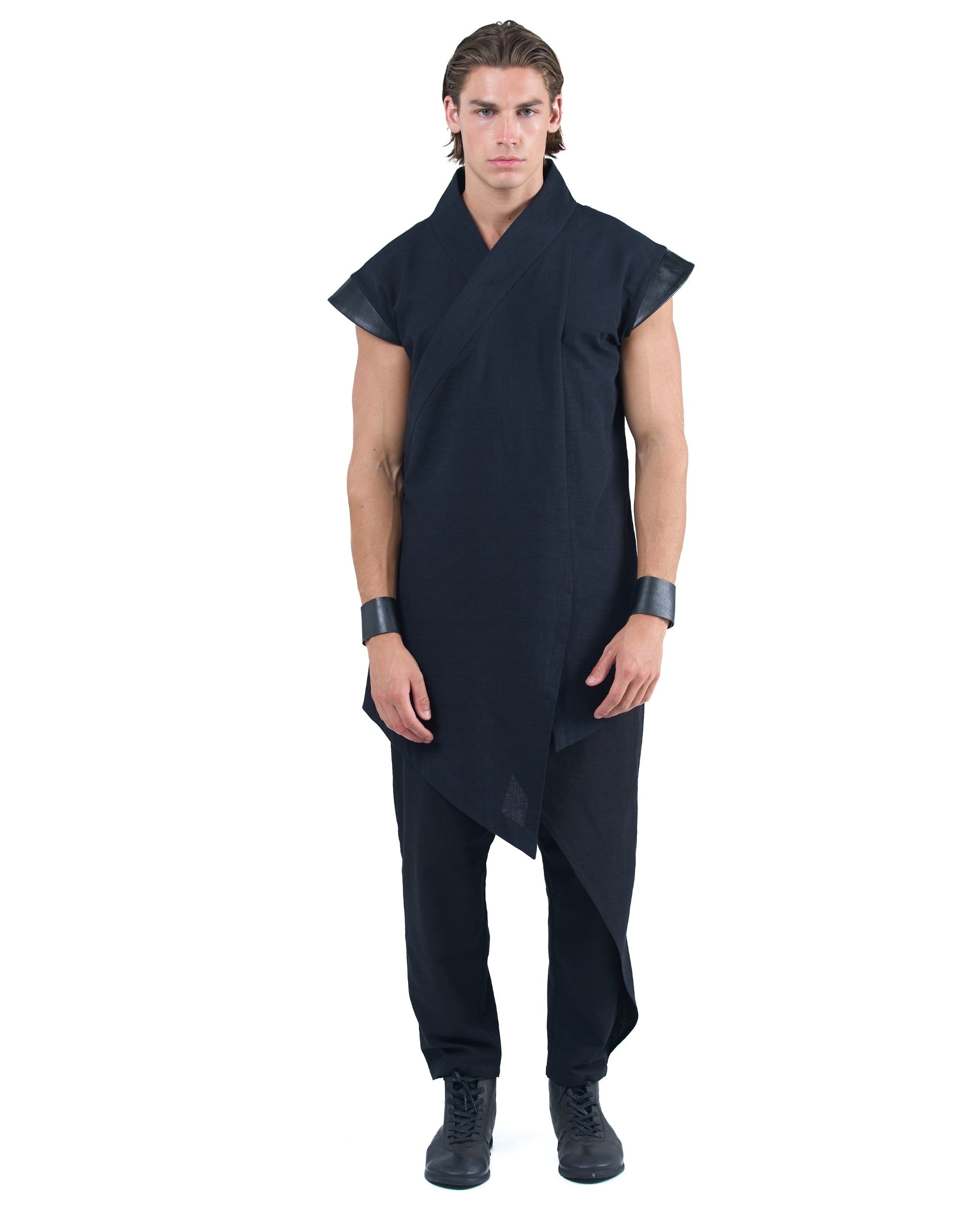 Black asymmetric kimono-style shirt with leather shoulders and wrap front by OVERZ worn by male model