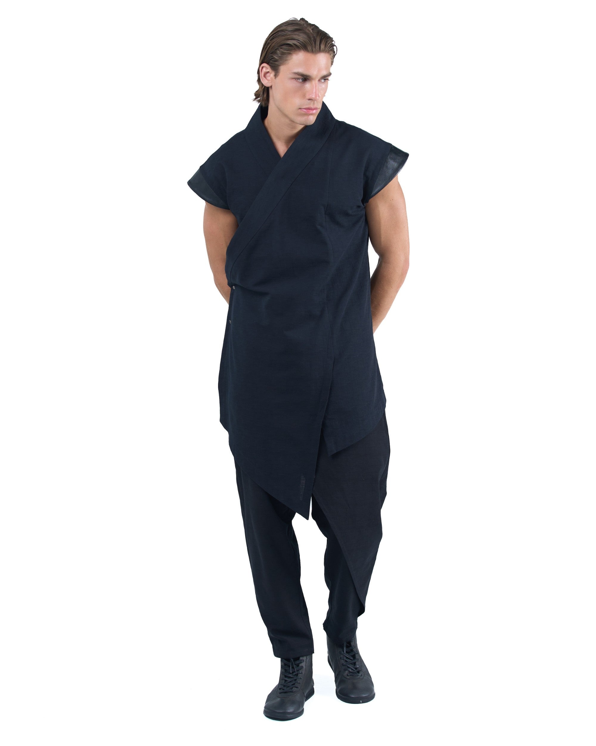 Black asymmetric kimono-style shirt with leather shoulders and wrap front by OVERZ worn by male model