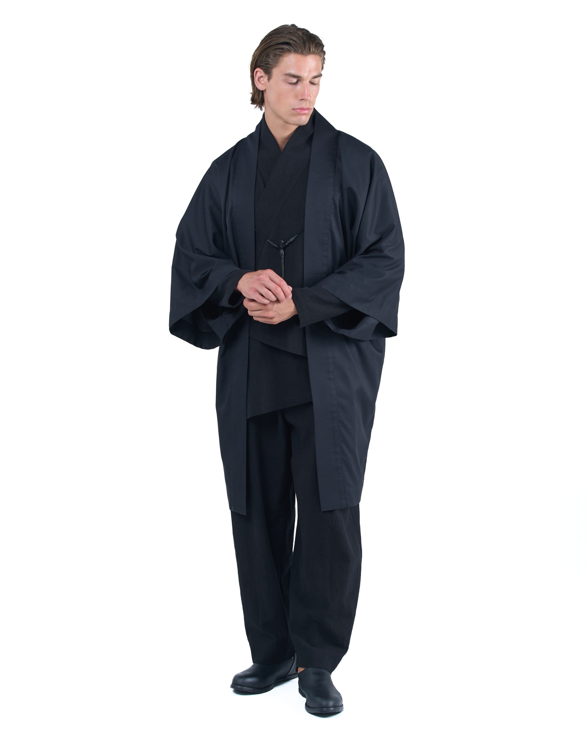 Black straight kimono jacket with leather haori himo and bison horn closure by OVERZ