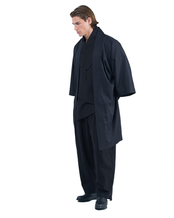 Black straight kimono jacket with leather haori himo and bison horn closure by OVERZ