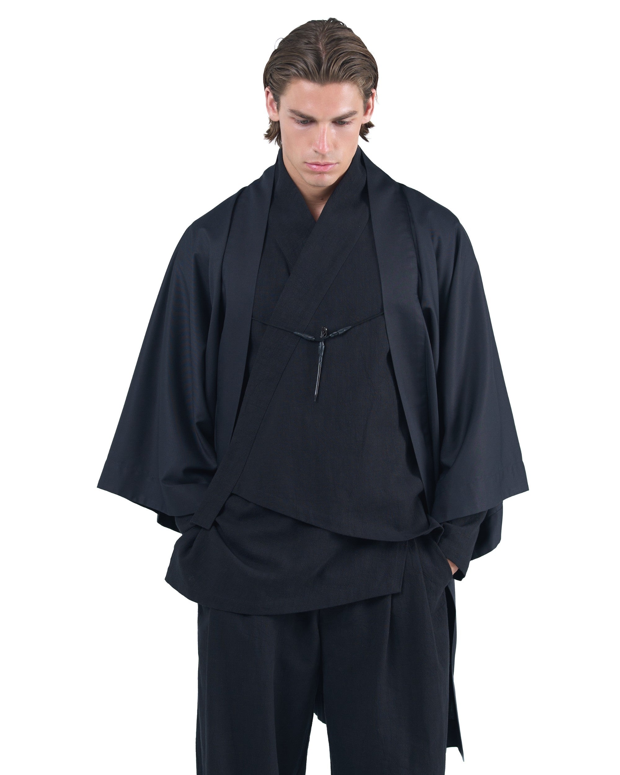 Black straight kimono jacket with leather haori himo and bison horn closure by OVERZ