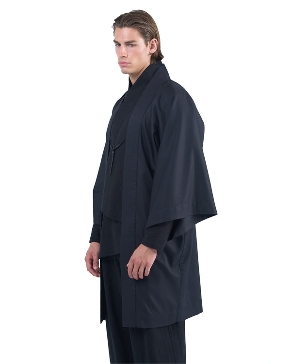 Black straight kimono jacket with leather haori himo and bison horn closure by OVERZ