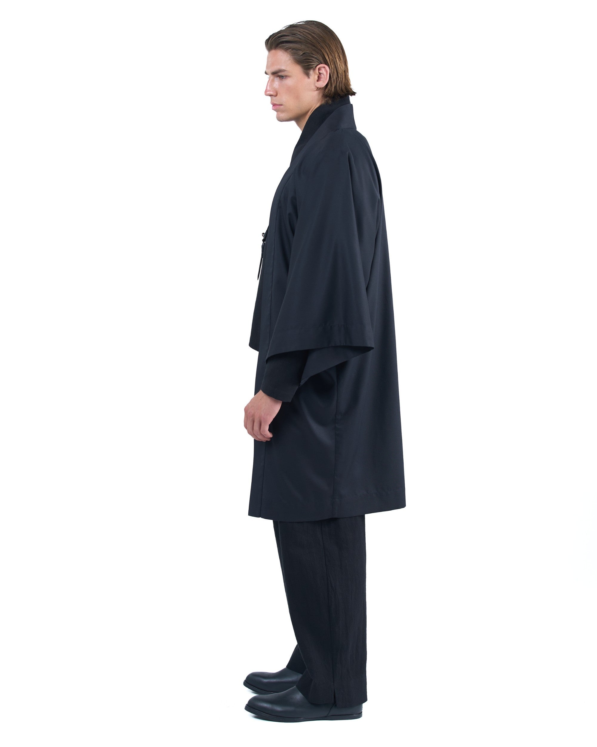 Black straight kimono jacket with leather haori himo and bison horn closure by OVERZ